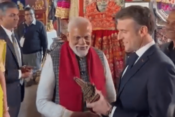 Prime Minister Narendra Modi gifts a replica of Ram Mandir to French President Emmanuel Macron